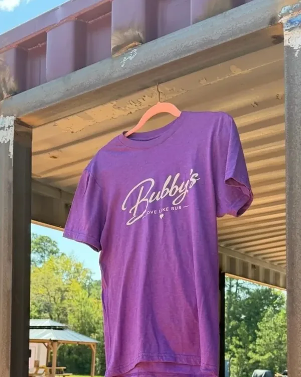 Bubby's Shirt, purple, on a pink hanger