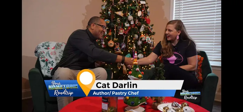 Ms. Darlin' on the Fox 54 Mornings set with the cookbook